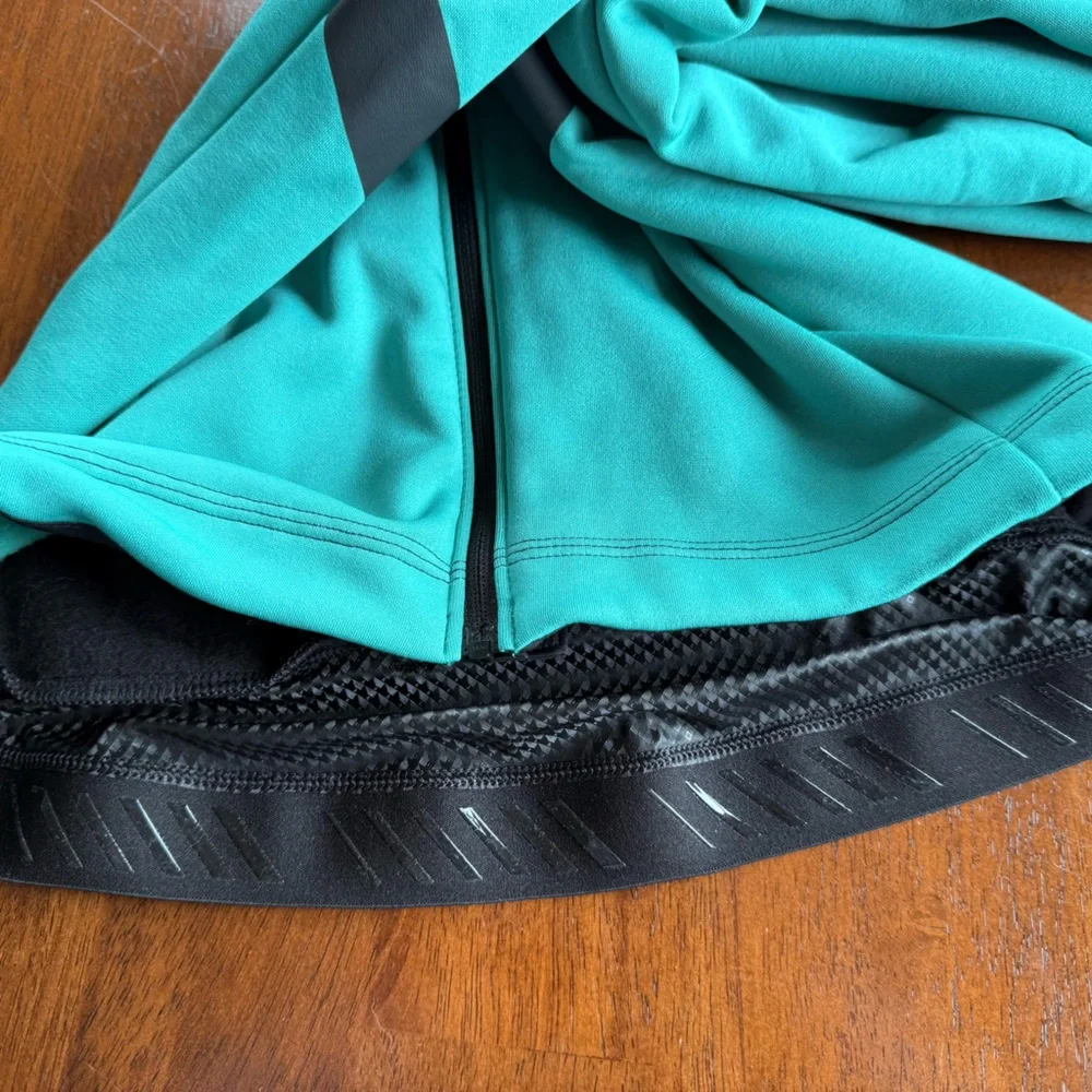 Pearl Izumi Women’s Teal Black Long-Sleeve Cycling Jersey Bottle Pockets Medium - Picture 8 of 9